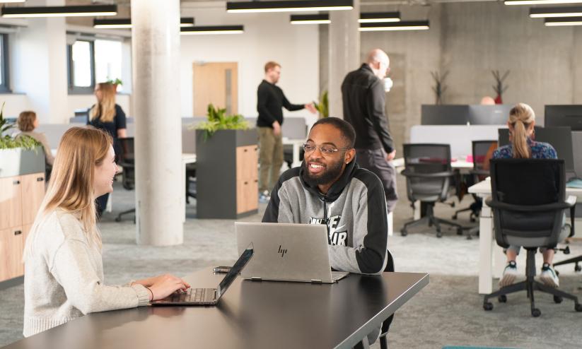 Man and a woman co-working at Streamline