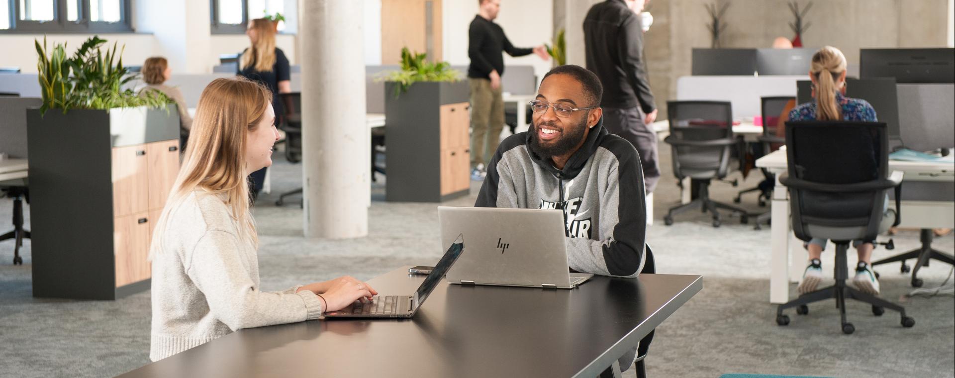 Man and a woman co-working at Streamline