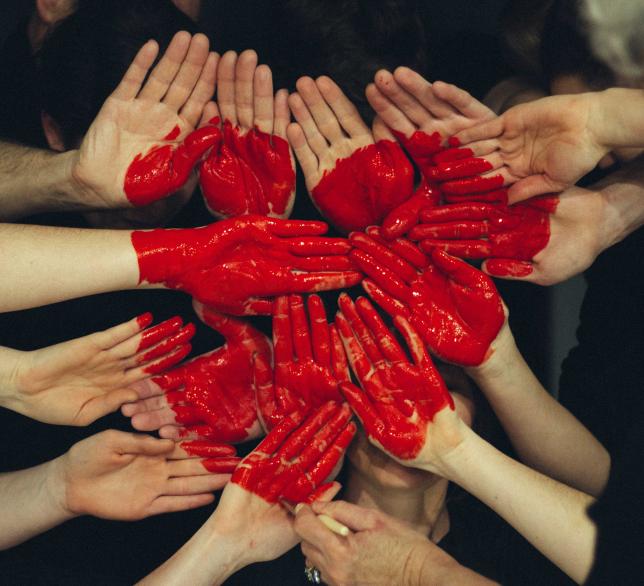 heart painted on hands