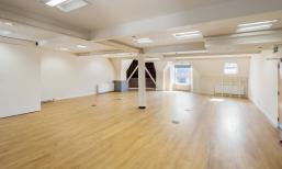 Light and airy office space for charities in Edinburgh with wooden floors